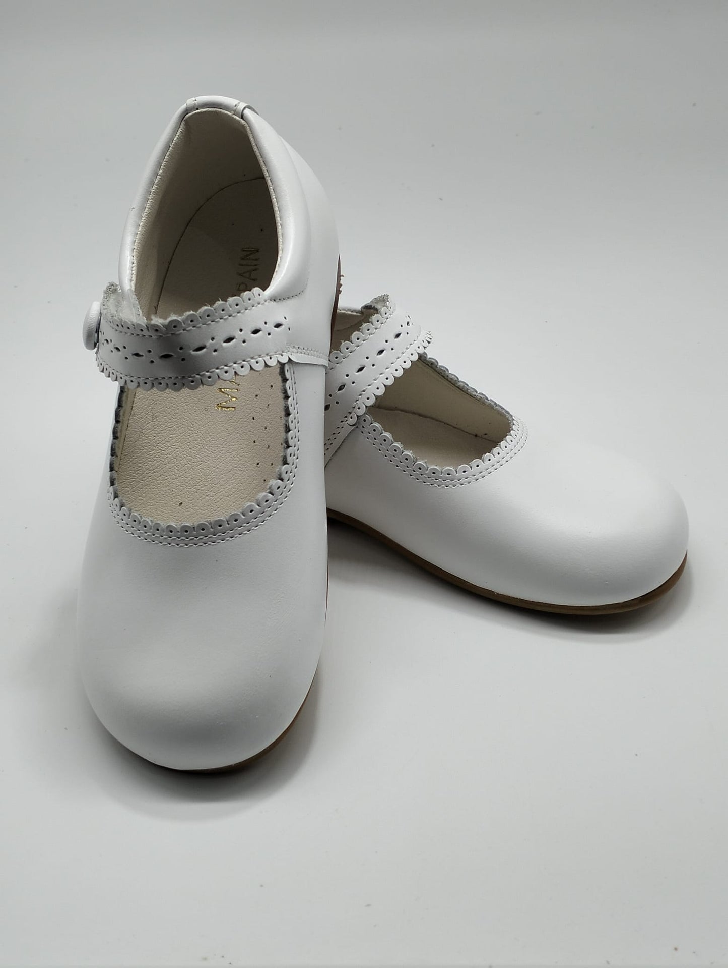 White hard sole shoes