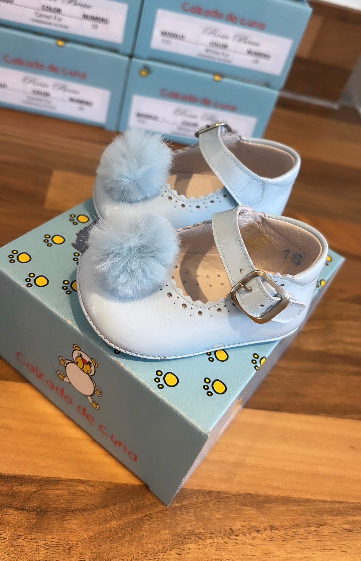Soft sole baby pom pom shoes