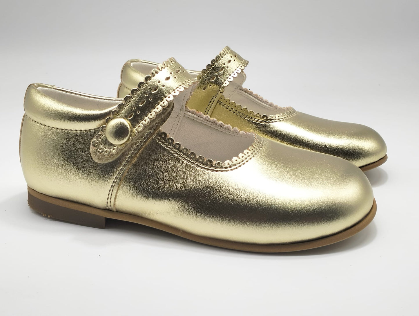 Gold hard sole shoes
